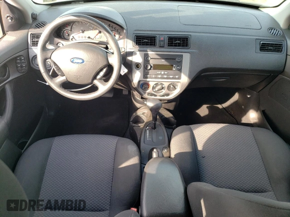 2007 Ford Focus S with VIN 1FAHP37N67W268162, listed as a Copart auction lot 71736384 with 69,391 mi miles and Salvage Title. Bid and sale history available at DreamBid. Image 8.