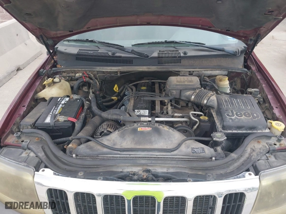 2003 Jeep Grand Cherokee Laredo with VIN 1J4GW48S83C563627, listed as a IAAI auction lot 41910225 with 150,264 mi miles. Bid and sale history available at carsss.com. Image 10.