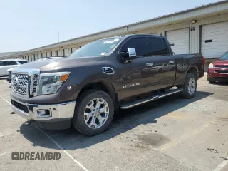 2016 Nissan Titan SL z VIN 1N6BA1F20GN518043, wystawiony jako Copart lot #59132165 z przebiegiem Nie podano mil oraz Czysty tytuł • Clean title. Historia ofert i sprzedaży dostępna na DreamBid. Obrazek 1.