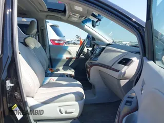 2014 Toyota Sienna XLE with VIN 5TDYK3DC2ES492554, listed as a IAAI auction lot 41685109 with 196,619 mi miles and . Bid and sale history available at DreamBid. Image 5.