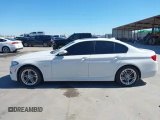 2014 BMW 5 Series 528i with VIN WBA5A5C50ED503130, listed as a IAAI auction lot 41819922 with 135,923 mi miles. Bid and sale history available at carsss.com. Image 14.