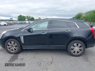 2015 Cadillac SRX Luxury Collection z VIN 3GYFNEE34FS510360, wystawiony jako IAAI lot #42343737 z przebiegiem 149 046 mil mil oraz . Historia ofert i sprzedaży dostępna na DreamBid. Obrazek 14.