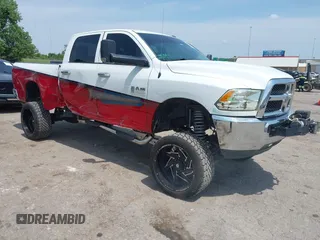 2015 Ram 2500 Tradesman z VIN 3C6UR5CJ4FG529374, wystawiony jako IAAI lot #42477534 z przebiegiem 182 259 mil mil oraz . Historia ofert i sprzedaży dostępna na DreamBid. Obrazek 1.