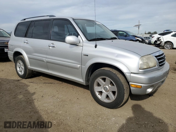 2003 Suzuki XL7 Touring z VIN JS3TX92V934111781, wystawiony jako Copart lot #47422395 z przebiegiem 248 137 mil mil oraz Czysty tytuł • Clean title. Historia ofert i sprzedaży dostępna na DreamBid. Obrazek 4.
