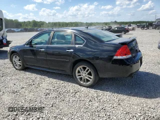 2014 Chevrolet Impala LTZ with VIN 2G1WC5E33E1164638, listed as a Copart auction lot 58699635 with 189,636 mi miles and Salvage title. Bid and sale history available at DreamBid. Image 2.