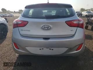 2014 Hyundai Elantra GT with VIN KMHD35LH1EU184769, listed as a Copart auction lot 61756033 with 71,615 mi miles and Salvage Title. Bid and sale history available at carsss.com. Image 6.