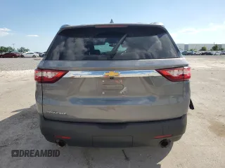 2021 Chevrolet Traverse LS z VIN 1GNERFKW4MJ206011, wystawiony jako Copart lot #59190965 z przebiegiem 64 002 mil mil oraz Nie do naprawy • Non repairable. Historia ofert i sprzedaży dostępna na DreamBid. Obrazek 6.