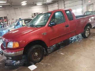 2004 Ford F-150 XL with VIN 2FTRX18W74CA40690, listed as a IAAI auction lot 41507958 with 182,136 mi miles and . Bid and sale history available at DreamBid. Image 2.