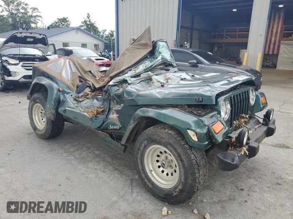 2000 Jeep Wrangler Sahara with VIN 1J4FA59SXYP785570, listed as a Copart auction lot 57659664 with 0 mi miles and Salvage Title. Bid and sale history available at carsss.com. Image 4.