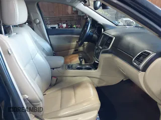 2014 Jeep Grand Cherokee Limited z VIN 1C4RJFBG2EC320282, wystawiony jako IAAI lot #42067273 z przebiegiem 78 061 mil mil oraz . Historia ofert i sprzedaży dostępna na DreamBid. Obrazek 5.