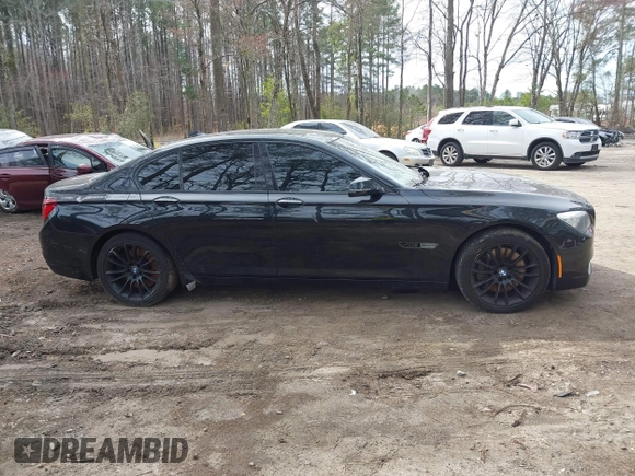 2013 BMW 7 Series 750i xDrive with VIN WBAYB6C59DD223947, listed as a IAAI auction lot 41585255 with Not provided miles and . Bid and sale history available at DreamBid. Image 12.