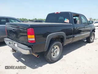 2003 GMC Sierra 1500HD SLE z VIN 1GTGK13U63F136146, wystawiony jako IAAI lot #42020608 z przebiegiem 170 466 mil mil oraz . Historia ofert i sprzedaży dostępna na DreamBid. Obrazek 4.
