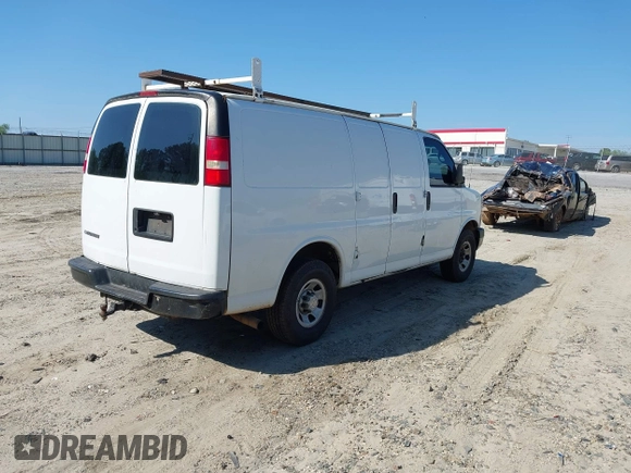 2009 Chevrolet Express Cargo Van with VIN 1GCGG25C791125061, listed as a IAAI auction lot 42131397 with 247,397 mi miles. Bid and sale history available at carsss.com. Image 4.
