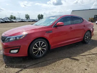 2015 Kia Optima LX z VIN KNAGM4A78F5631688, wystawiony jako Copart lot #61570775 z przebiegiem 218 891 mil mil oraz Czysty tytuł • Clean title. Historia ofert i sprzedaży dostępna na DreamBid. Obrazek 1.