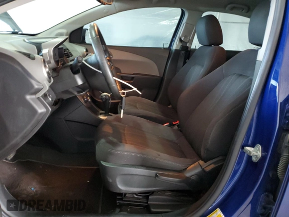 2014 Chevrolet Sonic LT with VIN 1G1JC5SHXE4171858, listed as a Copart auction lot 51755405 with 108,004 mi miles and Salvage Title. Bid and sale history available at DreamBid. Image 7.