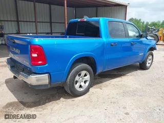 2025 Ram 1500 Big Horn with VIN 1C6SRFFP2SN562047, listed as a IAAI auction lot 42087415 with 27,583 mi miles. Bid and sale history available at carsss.com. Image 4.