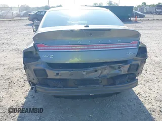 2016 Lincoln MKZ z VIN 3LN6L2G96GR601677, wystawiony jako IAAI lot #42647759 z przebiegiem 87 283 mil mil oraz . Historia ofert i sprzedaży dostępna na DreamBid. Obrazek 6.