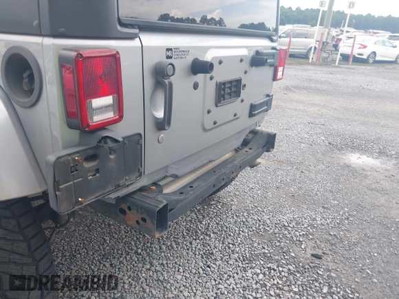 2016 Jeep Wrangler Unlimited Sahara with VIN 1C4BJWEG5GL117872, listed as a IAAI auction lot 42692798 with 119,819 mi miles and . Bid and sale history available at DreamBid. Image 6.