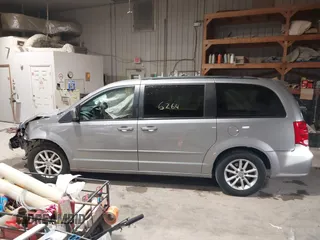 2014 Dodge Grand Caravan SXT z VIN 2C4RDGCGXER263963, wystawiony jako IAAI lot #41956264 z przebiegiem 138 815 mil mil oraz . Historia ofert i sprzedaży dostępna na DreamBid. Obrazek 14.