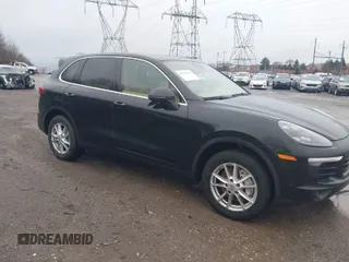 2016 Porsche Cayenne with VIN WP1AA2A28GLA06519, listed as a IAAI auction lot 41520326 with 144,828 mi miles. Bid and sale history available at carsss.com. Image 1.
