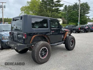 2008 Jeep Wrangler X with VIN 1J4FA24168L582227, listed as a Copart auction lot 58219065 with 98,284 mi miles and Salvage title. Bid and sale history available at DreamBid. Image 4.