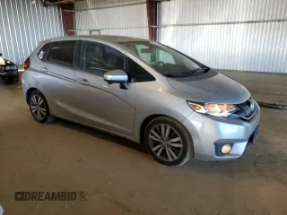 2015 Honda Fit EX-L with VIN 3HGGK5H83FM707228, listed as a Copart auction lot 50006055 with 97,573 mi miles and Salvage title. Bid and sale history available at DreamBid. Image 4.