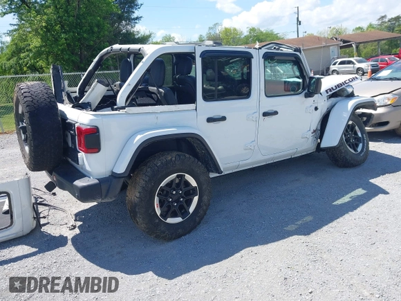 2020 Jeep Wrangler Unlimited Rubicon z VIN 1C4JJXFM5LW278740, wystawiony jako IAAI lot #42086112 z przebiegiem 93 658 mil mil oraz . Historia ofert i sprzedaży dostępna na DreamBid. Obrazek 4.