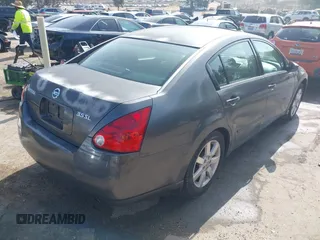 2006 Nissan Maxima SE z VIN 1N4BA41E96C859768, wystawiony jako IAAI lot #42474743 z przebiegiem 119 289 mil mil oraz . Historia ofert i sprzedaży dostępna na DreamBid. Obrazek 4.