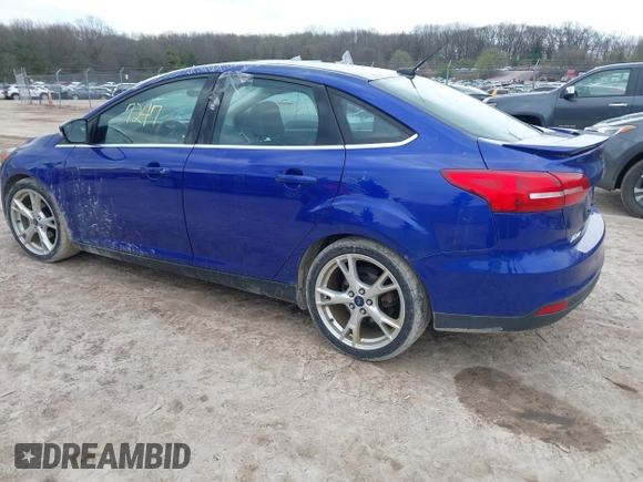 2015 Ford Focus Titanium with VIN 1FADP3J27FL298882, listed as a IAAI auction lot 42117247 with 124,185 mi miles and . Bid and sale history available at carsss.com. Image 3.