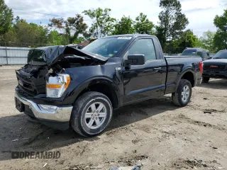 2021 Ford F-150 XL with VIN 1FTMF1EB4MKF09003, listed as a Copart auction lot 57849795 with 64,583 mi miles and Salvage title. Bid and sale history available at DreamBid. Image 1.
