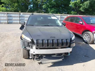 2018 Jeep Cherokee Latitude with VIN 1C4PJMCBXJD597667, listed as a IAAI auction lot 42486786 with 149,081 mi miles and . Bid and sale history available at DreamBid. Image 12.