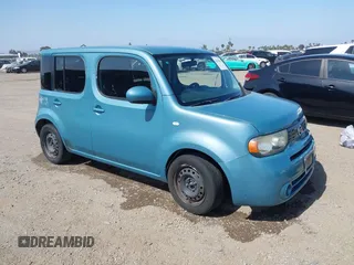 2010 Nissan Cube S z VIN JN8AZ2KR1AT170924, wystawiony jako IAAI lot #42278368 z przebiegiem 157 978 mil mil oraz . Historia ofert i sprzedaży dostępna na DreamBid. Obrazek 1.