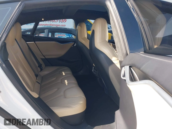 2016 Tesla Model S 90D with VIN 5YJSA1E27GF153525, listed as a IAAI auction lot 41539221 with 145,771 mi miles and . Bid and sale history available at DreamBid. Image 8.