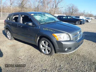 2012 Dodge Caliber SXT z VIN 1C3CDWDA6CD506571, wystawiony jako IAAI lot #41845451 z przebiegiem 99 496 mil mil oraz . Historia ofert i sprzedaży dostępna na DreamBid. Obrazek 1.