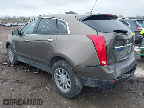 2015 Cadillac SRX Luxury Collection with VIN 3GYFNBE34FS521518, listed as a IAAI auction lot 41893073 with 82,700 mi miles and . Bid and sale history available at carsss.com. Image 3.