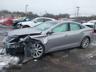 2014 Hyundai Azera Limited with VIN KMHFH4JG6EA361378, listed as a IAAI auction lot 41557210 with 58,561 mi miles. Bid and sale history available at carsss.com. Image 19.