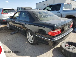 2001 Mercedes-Benz E-Class AWD with VIN WDBJF83J31X058259, listed as a Copart auction lot 74370604 with 131,454 mi miles and Clean Title. Bid and sale history available at carsss.com. Image 2.