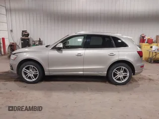 2014 Audi Q5 Premium Plus z VIN WA1LFAFP1EA075646, wystawiony jako IAAI lot #41528806 z przebiegiem 104 265 mil mil oraz . Historia ofert i sprzedaży dostępna na DreamBid. Obrazek 14.