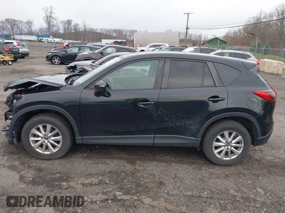 2016 Mazda CX-5 Touring with VIN JM3KE4CY4G0738713, listed as a IAAI auction lot 41998597 with 146,595 mi miles and . Bid and sale history available at carsss.com. Image 14.