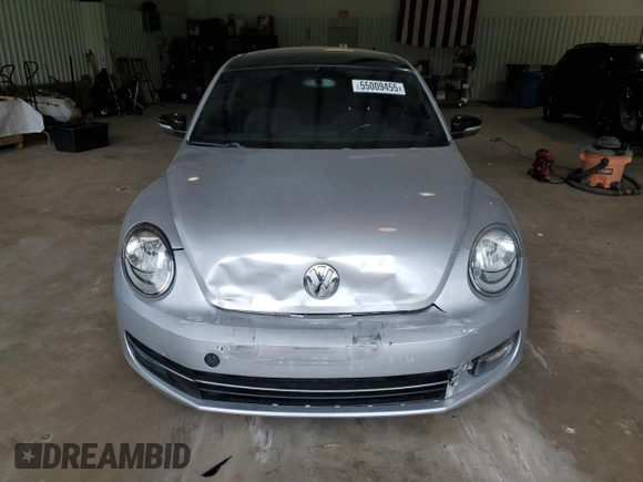2012 Volkswagen Beetle with VIN 3VWV67AT1CM663839, listed as a Copart auction lot 55009455 with 122,042 mi miles and Salvage Title. Bid and sale history available at DreamBid. Image 5.