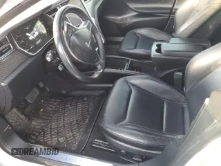 2016 Tesla Model S 90D with VIN 5YJSA1E24GF158505, listed as a Copart auction lot 87681485 with 91,225 mi miles and Salvage title. Bid and sale history available at DreamBid. Image 7.
