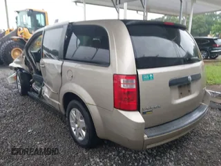 2009 Dodge Grand Caravan SE z VIN 2D8HN44E59R585342, wystawiony jako IAAI lot #42241676 z przebiegiem 329 636 mil mil oraz . Historia ofert i sprzedaży dostępna na DreamBid. Obrazek 3.