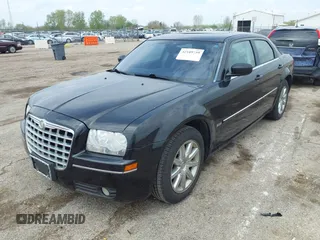 2008 Chrysler 300 Touring with VIN 2C3LA53G08H147012, listed as a IAAI auction lot 42109759 with 169,244 mi miles. Bid and sale history available at carsss.com. Image 2.