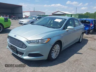 2014 Ford Fusion SE Hybrid with VIN 3FA6P0LU8ER251057, listed as a IAAI auction lot 42150589 with 188,192 mi miles and . Bid and sale history available at DreamBid. Image 17.