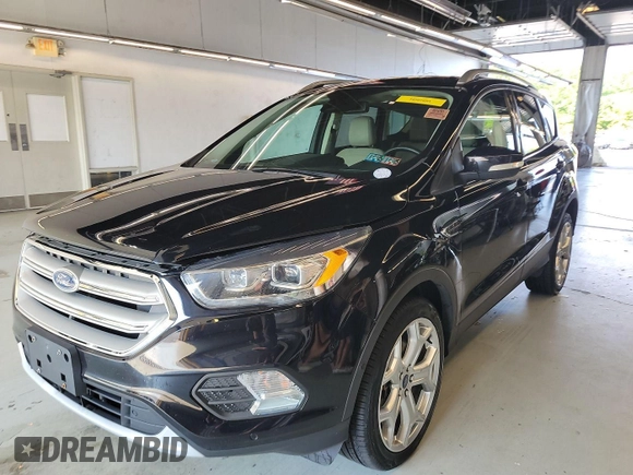 2019 Ford Escape Titanium with VIN 1FMCU9J96KUA01051, listed as a IAAI auction lot 42841649 with 69,720 mi miles and . Bid and sale history available at DreamBid. Image 16.