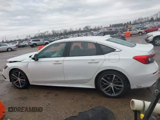 2023 Honda Civic Touring z VIN 2HGFE1F93PH304731, wystawiony jako IAAI lot #41675935 z przebiegiem 27 435 mil mil oraz . Historia ofert i sprzedaży dostępna na DreamBid. Obrazek 14.
