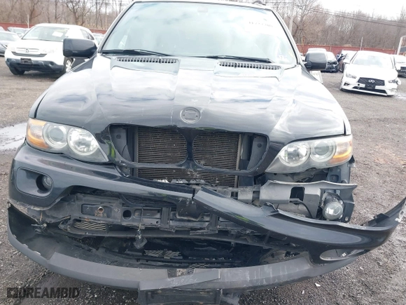 2006 BMW X5 4.4i with VIN 5UXFB53506LV22836, listed as a IAAI auction lot 41727708 with 186,084 mi miles. Bid and sale history available at carsss.com. Image 6.