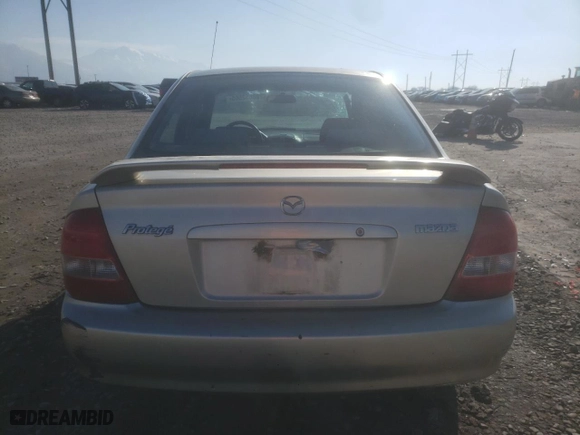 2003 Mazda Protege DX with VIN JM1BJ225431109585, listed as a Copart auction lot 88652505 with 246,348 mi miles and Salvage Title. Bid and sale history available at carsss.com. Image 6.