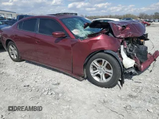 2019 Dodge Charger SXT with VIN 2C3CDXBG9KH728150, listed as a Copart auction lot 50713045 with 148,030 mi miles and Salvage title. Bid and sale history available at DreamBid. Image 4.