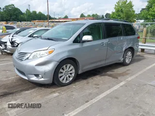 2013 Toyota Sienna XLE with VIN 5TDDK3DC3DS054803, listed as a IAAI auction lot 42389252 with 185,843 mi miles and . Bid and sale history available at DreamBid. Image 2.